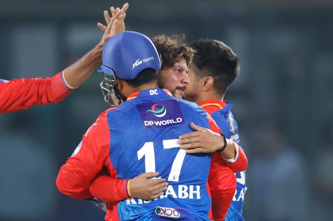 Rishabh Pant and Kuldeep Yadav celebrate after taking a wicket