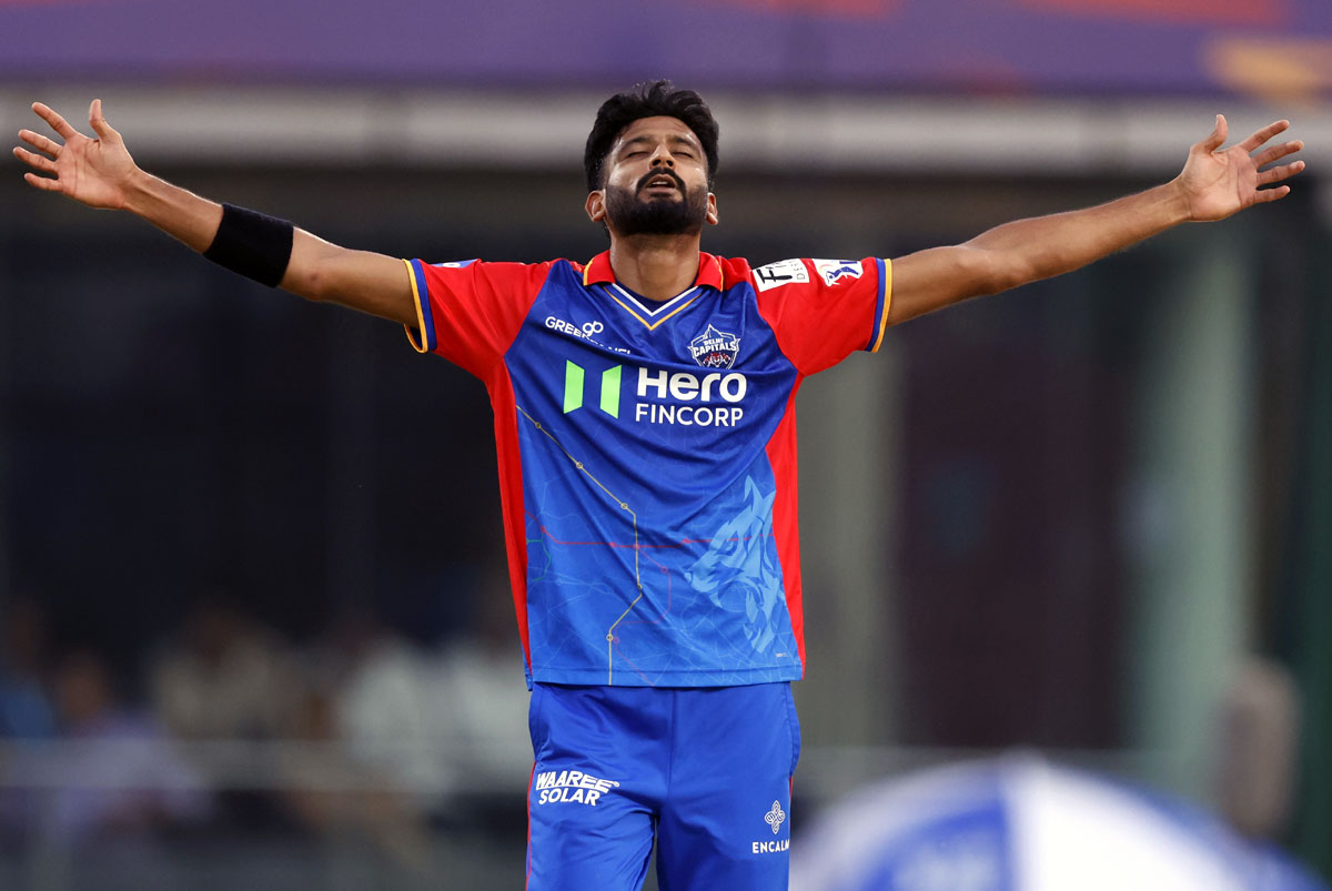 Khaleel Ahmed celebrates the wicket of Suryakumar Yadav.