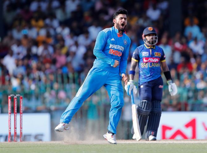 India's debutant Riyan Parag celebrates the wicket of centurion Avishka Fernando