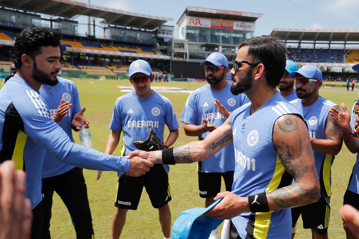 Virat Kohli presents Riyan Parag his debut ODI cap in the 3rd match against Sri Lanka, in Colombo, on Wednesday