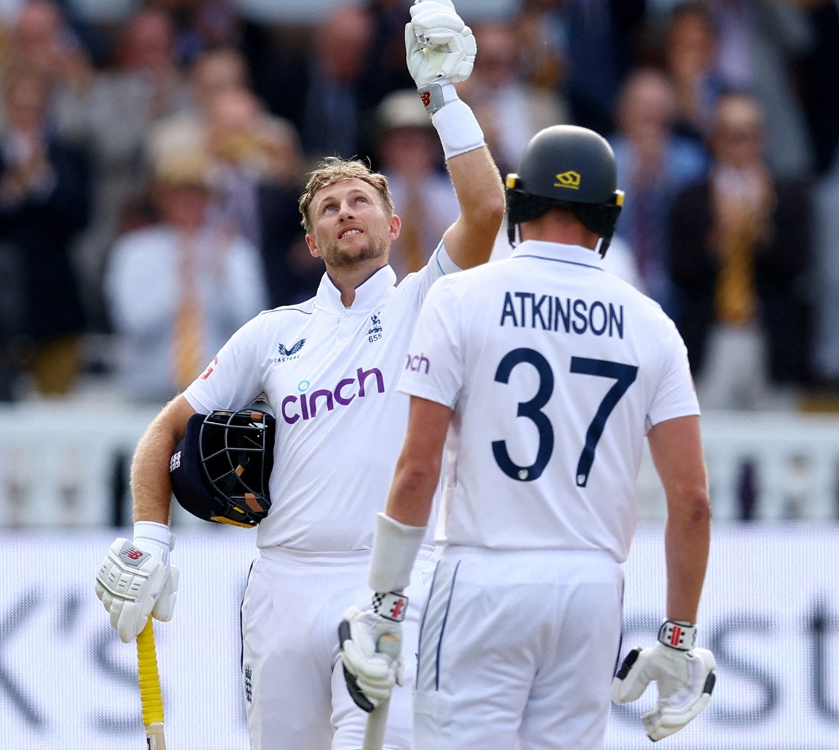 England's Joe Root celebrates after scoring his 33rd Test century during Day 1 of the second Test against Sri Lanka at Lord's on Thursday.