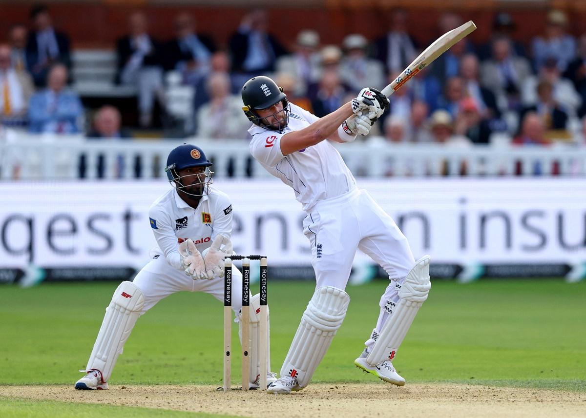 Gus Atkinson hits a six runs off the bowling of Sri Lanka's Kamindu Mendis.