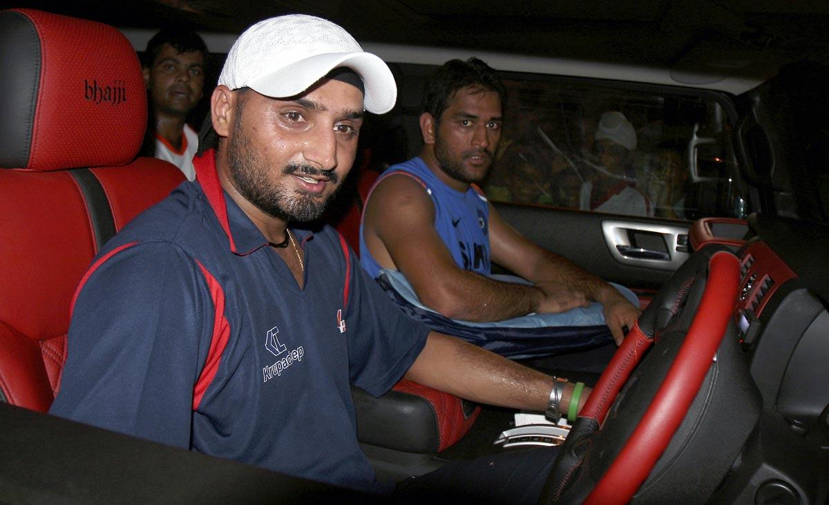 Mahendra Singh Dhoni with Harbhajan Singh