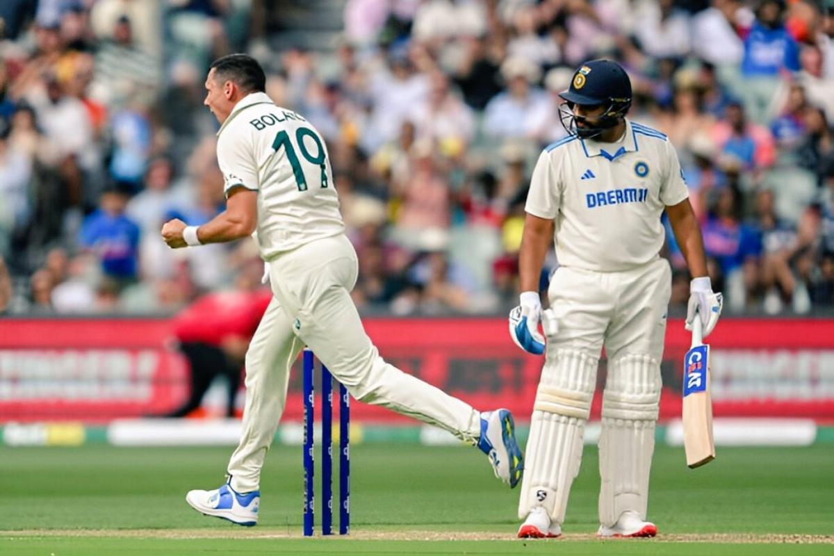 Scott Boland celebrates trapping Rohit Sharma LBW for 3