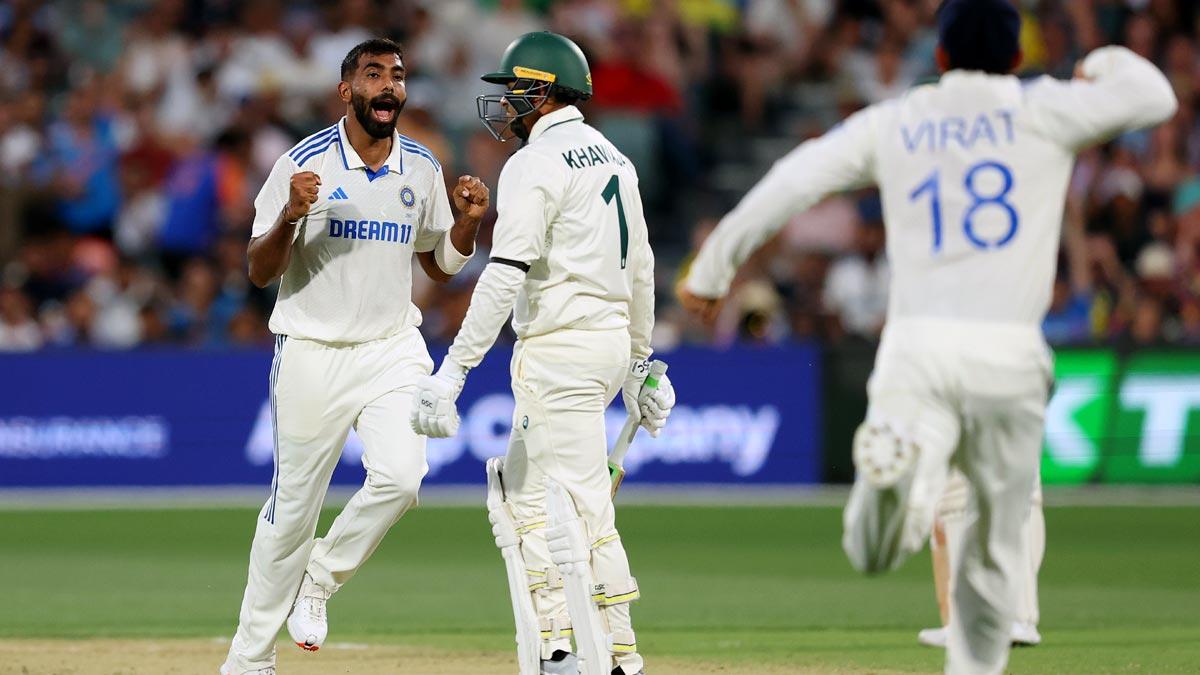 Jasprit Bumrah celebrates the wicket of Usman Khawaja.