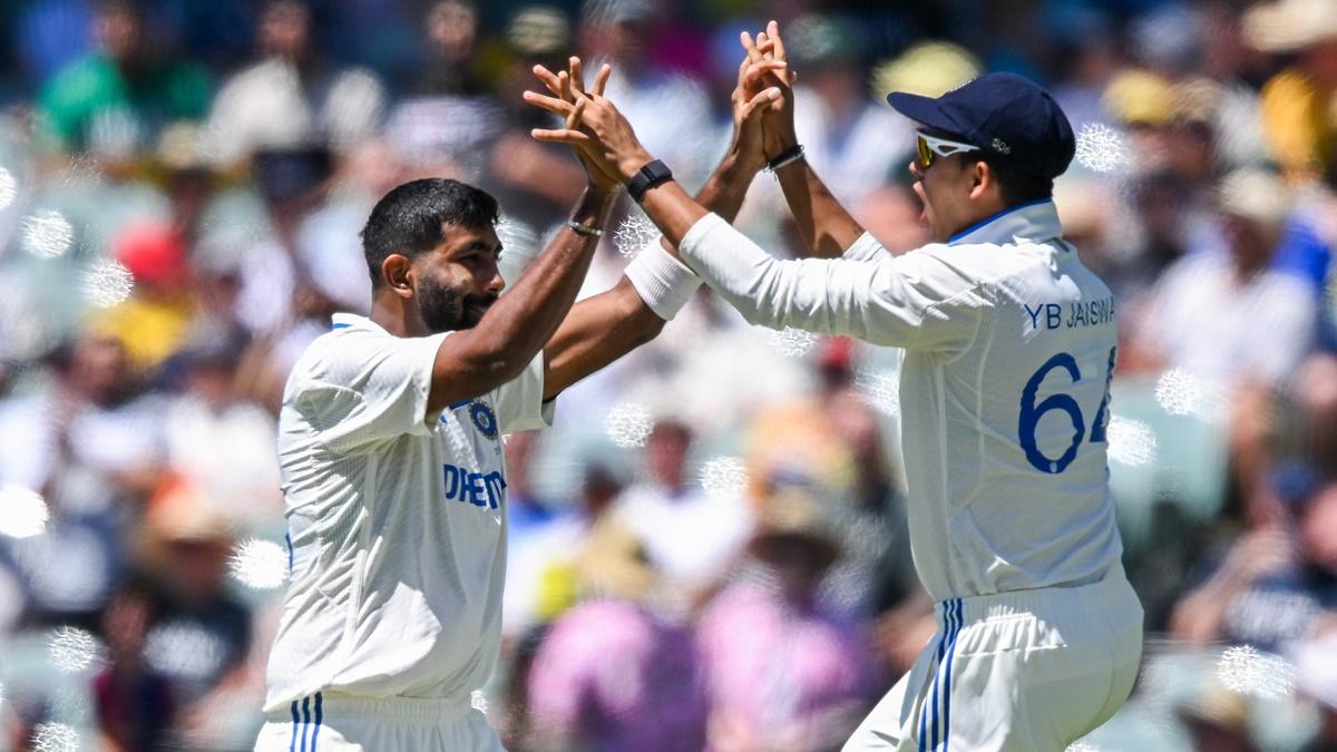 Jasprit Bumrah celebrates with Yashasvi Jaiswal after having Steve Smith caught behind by wicketkeeper Rishabh Pant.