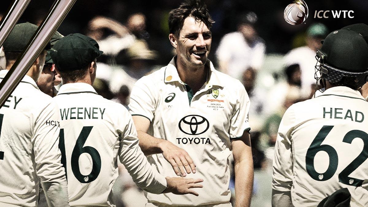 Australia's players rejoice after Pat Cummis dismissed Nitish Reddy.