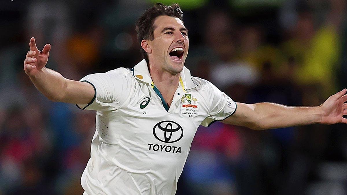 Australia captain Pat Cummins celebrates with teammates after taking his fifth wicket in India's second innings on Day 3 of the 'Pink-ball' second Test in Adelaide on Sunday.