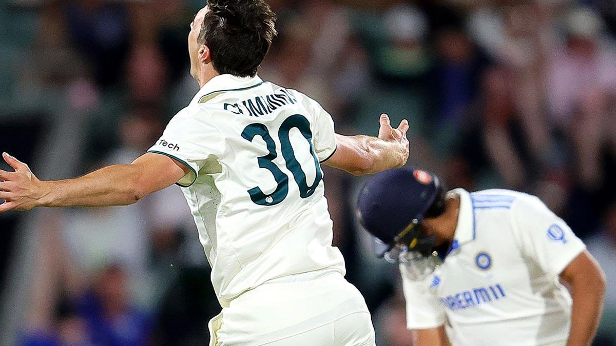 Pat Cummins celebrates the wicket of Rohit Sharma