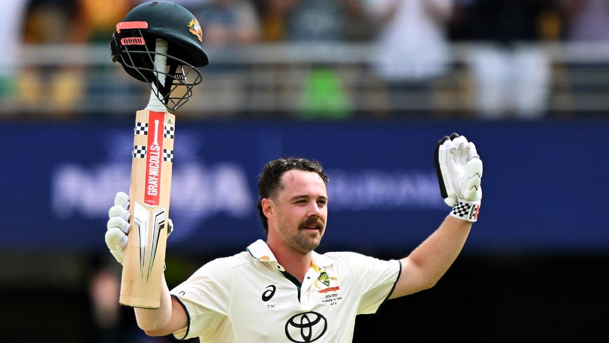 Travis Head celebrates his century