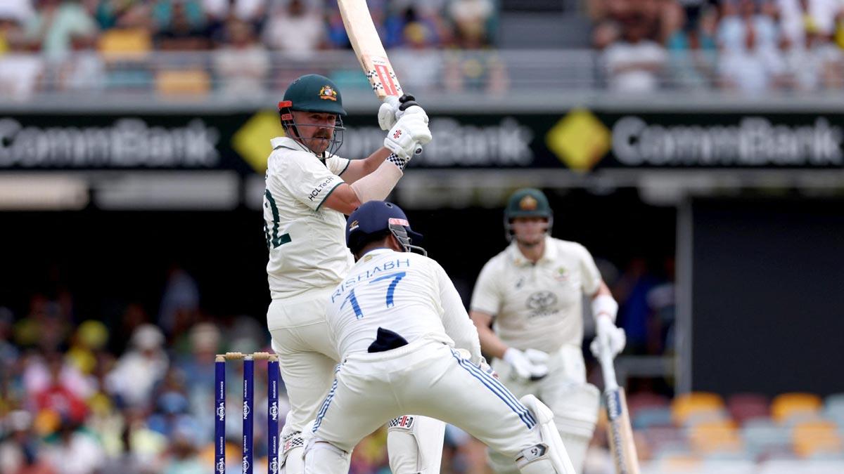 Travis Head bats en route his entertaining 52 on Day 2 of the 3rd Test at the Gabba in Brisbane on Sunday