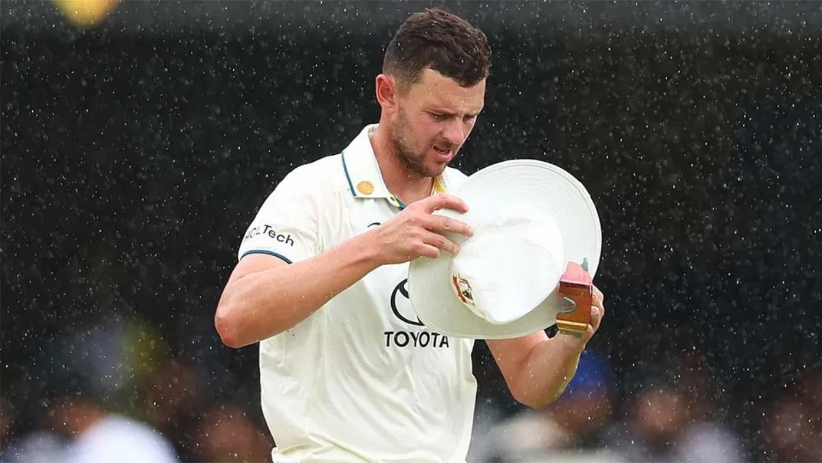 Australia pacer Josh Hazlewood leaves the field after bowling just one over