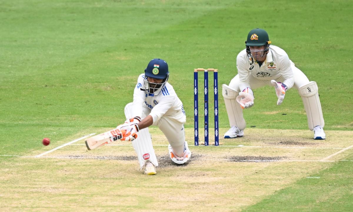 Ravindra  Jadeja plays the sweep shot 