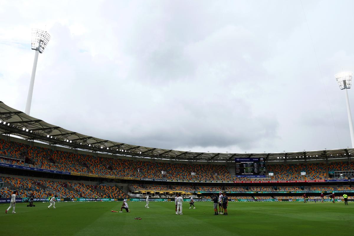 Players await for resumption of play 