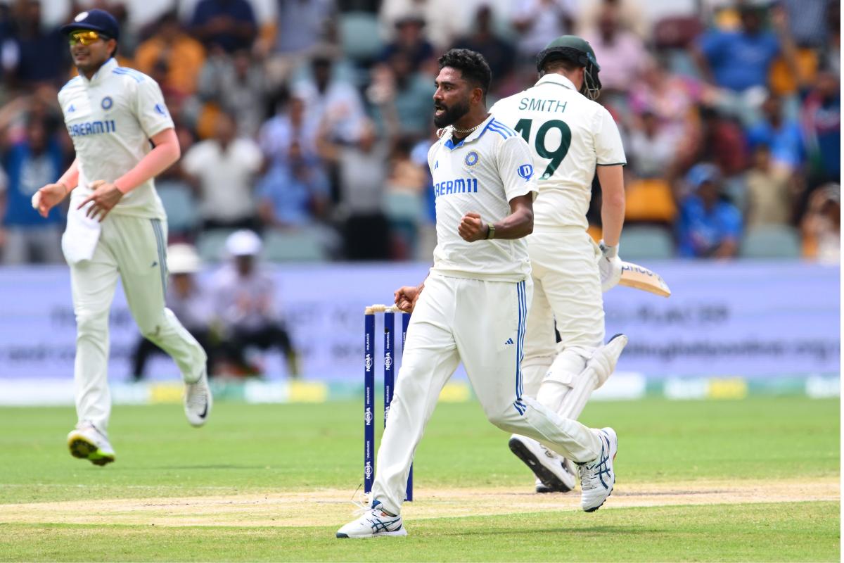 Mohammed Siraj celebrates the wicket of Steve Smith