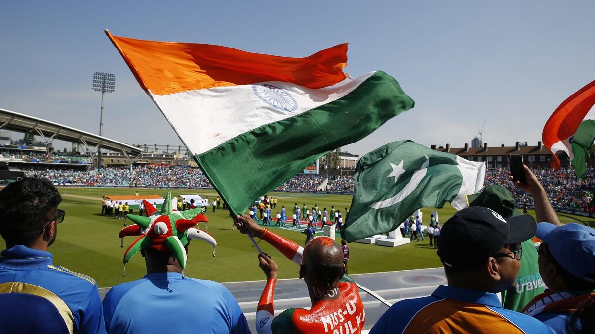 India and Pakistan fans wave flags before the 2017 ICC Champions Trophy final at The Oval, June 18, 2017.