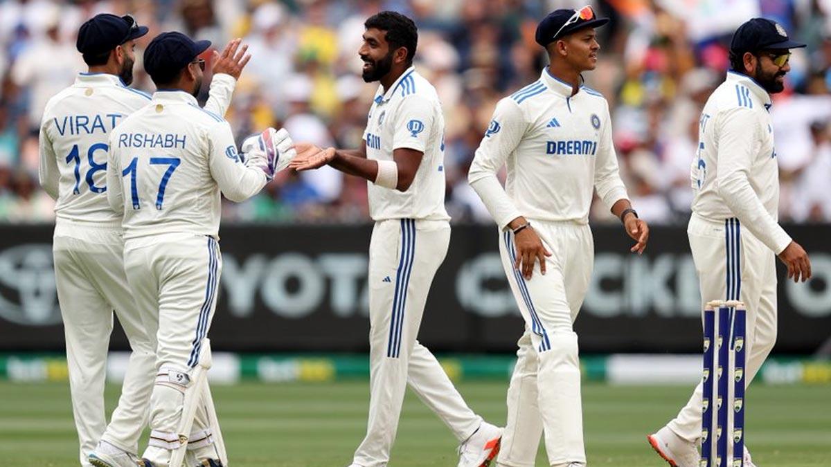 Jasprit Bumrah celebrates after taking the wicket of Usman Khawaja.