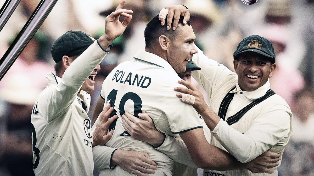 Australia's players celebrate after Scott Boland dismisses Virat Kohli