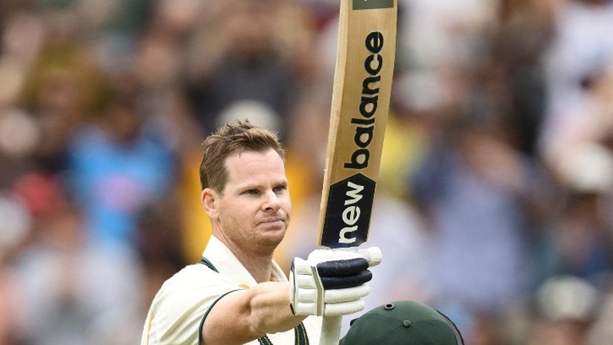 Steve Smith celebrates his century.