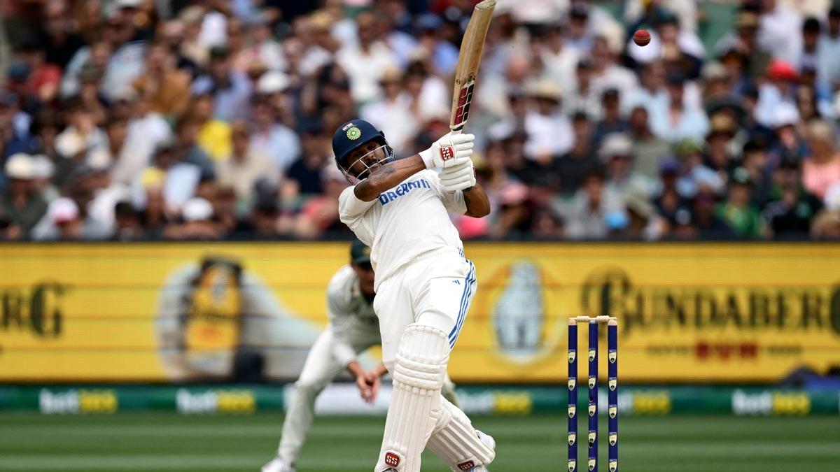 Nitish Reddy dispatches the ball to the boundary on Day 3. 