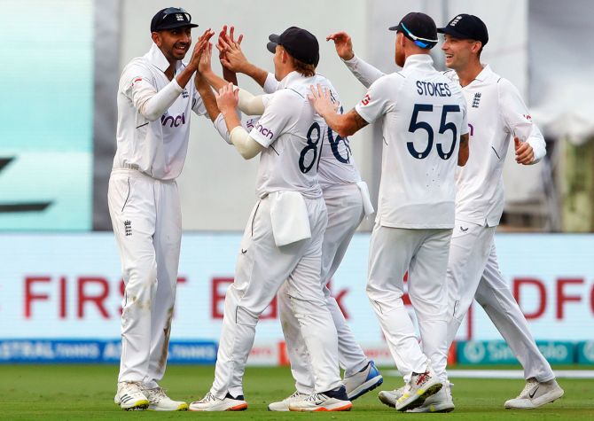England's players celebrate after Rehan Ahmed dismissed K S Bharat