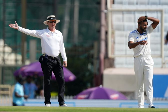 Umpire Rod Tucker signals a no ball, denying Akash Deep his maiden Test wicket