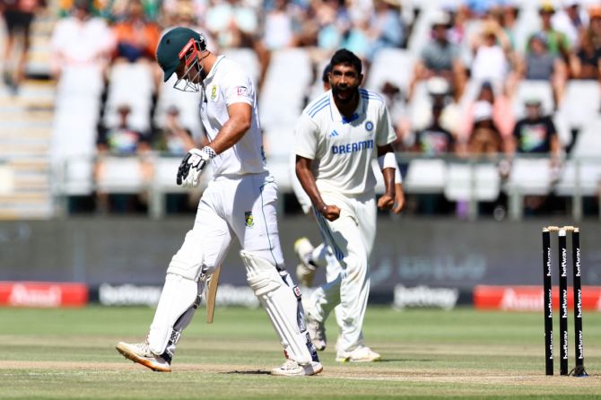 India's Jasprit Bumrah celebrates taking the wicket of South Africa's David Bedingham