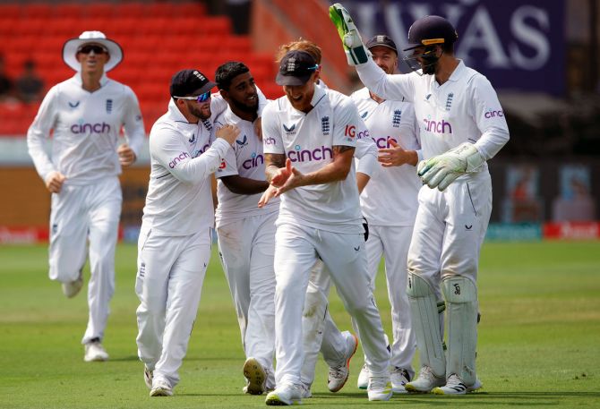 England players celebrate the wicket of Shreyas Iyer, who was caught at deep midwicket off Rehan Ahmed