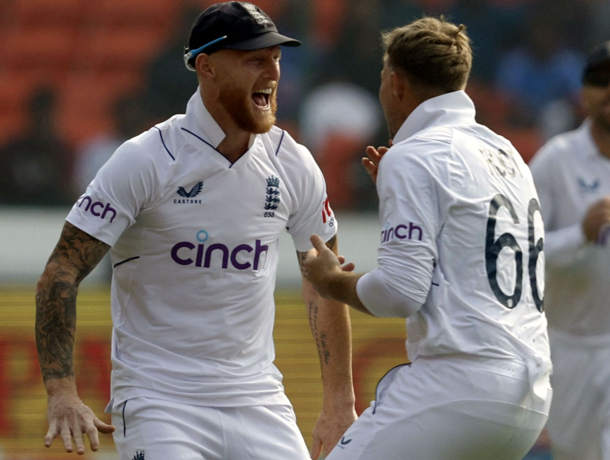 England's Joe Root celebrates with captain Ben Stokes after taking the wicket of Yashasvi Jaiswal
