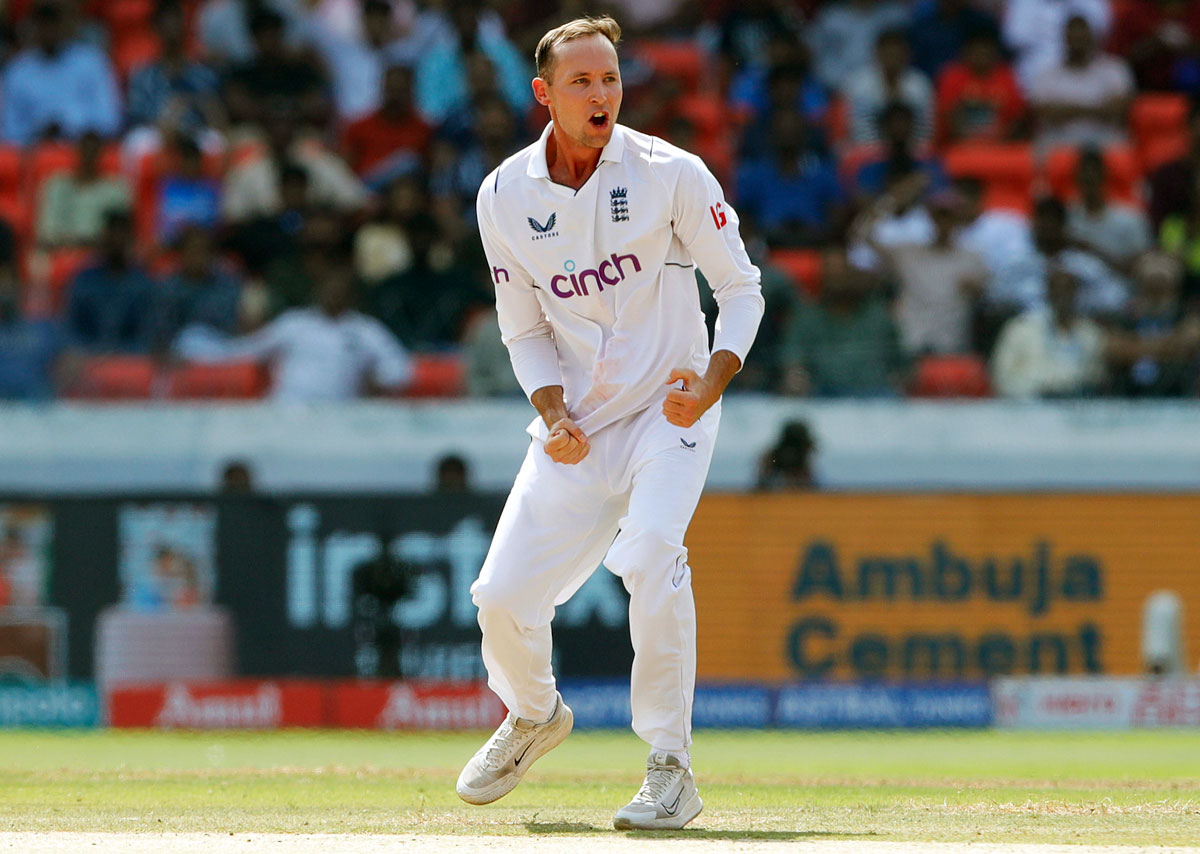 Tom Hartley celebrates the wicket of India captain Rohit Sharma.