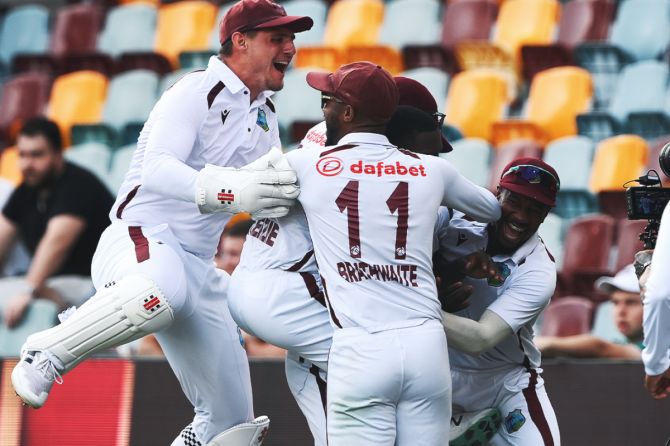 West Indies players celebrate after recording their first win in 27 years on Australian soil at the Gabba on Sunday