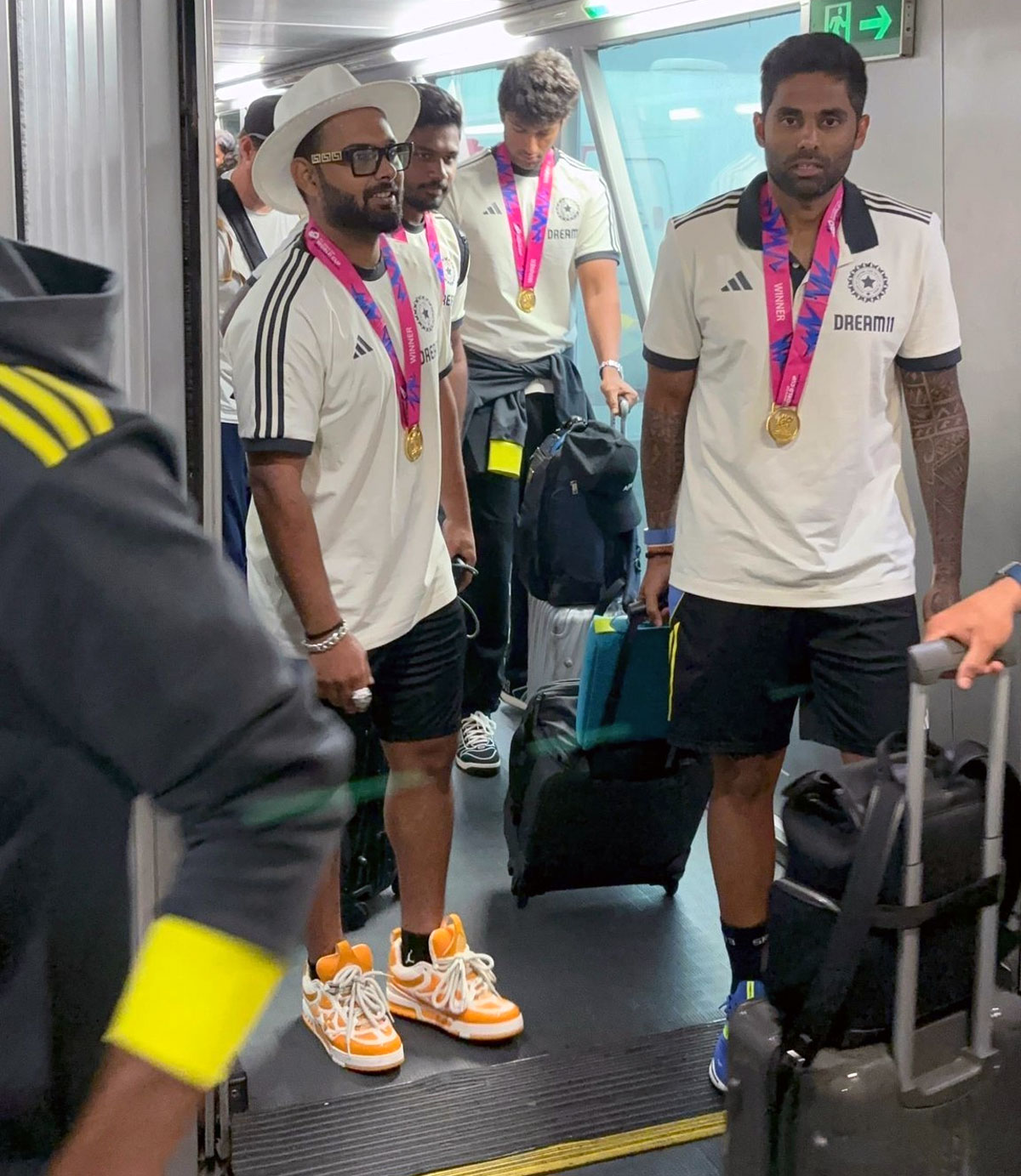 Rishabh Pant and Suryakumar Yadav getting off the aircraft 