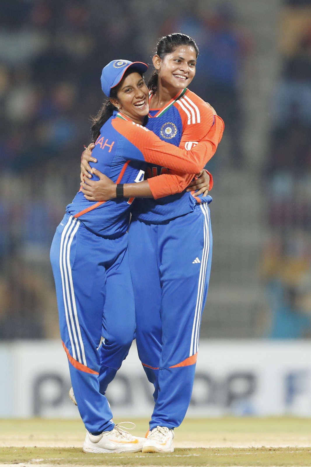 Jemimah Rodrigues celebrates with Radha Yadav after taking a wicket 