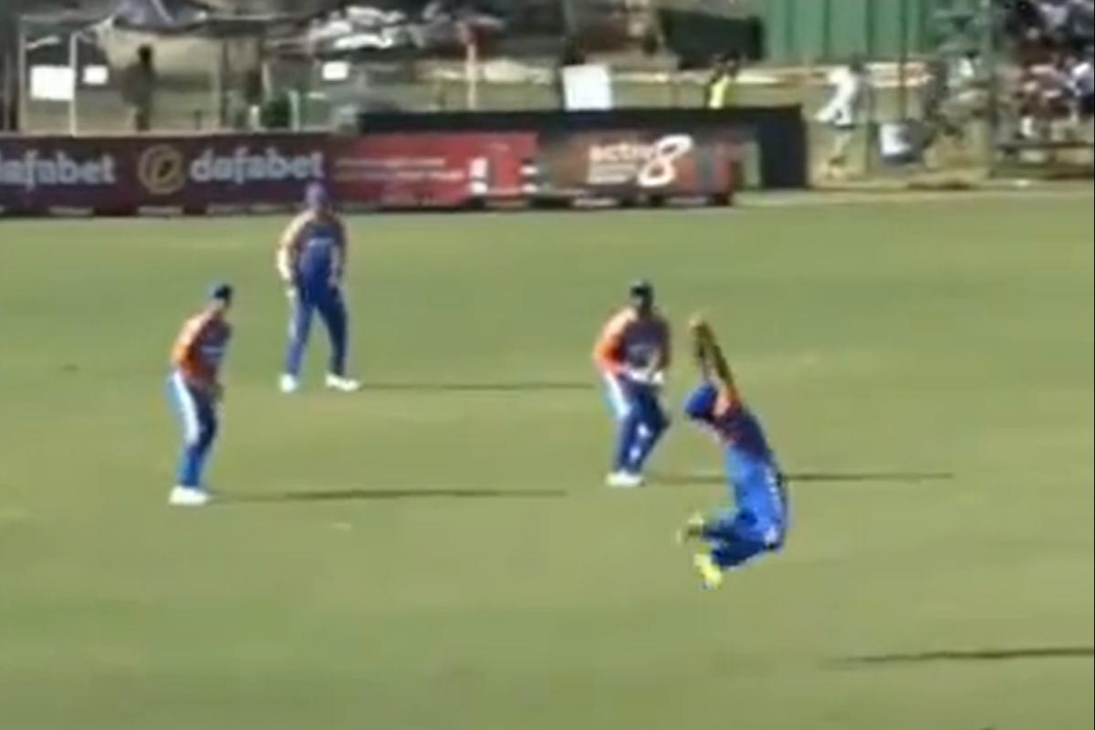 India's Ravi Bishnoi takes a blinder at backward point to dismiss Zimbabwe's Brian Bennett in the 3rd T20i in Harare, on Wednesday