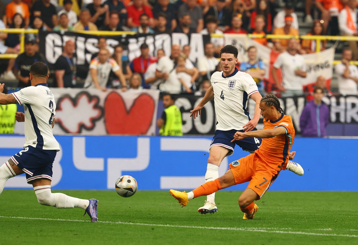 Xavi Simons drives the ball home from the top of the box to put the Netherlands ahead.