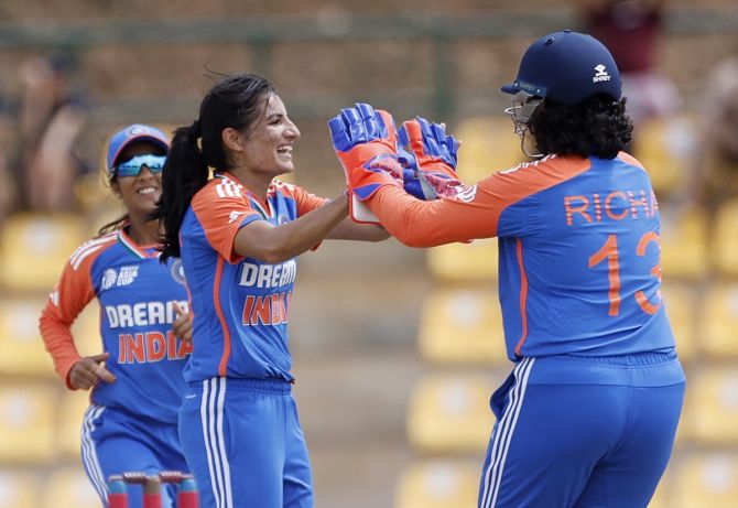 Pacer Renuka Singh, left, ran through Bangladesh's top order, finishing with figures of 3 for 10.