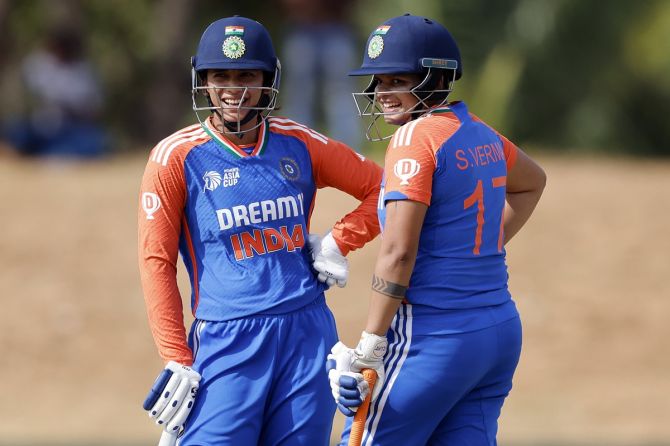 India openers Shafali Verma and Smriti Mandhana celebrate their 50-run partnership during the women's Asia Cup T20 semi-final against Bangladesh at Rangiri Dambulla International Stadium, Sri Lanka, on Friday.