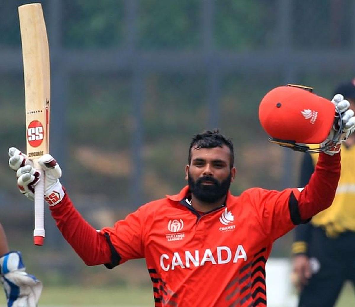 Canada opener Navneet Dhaliwal celebrates after scoring a half-century.