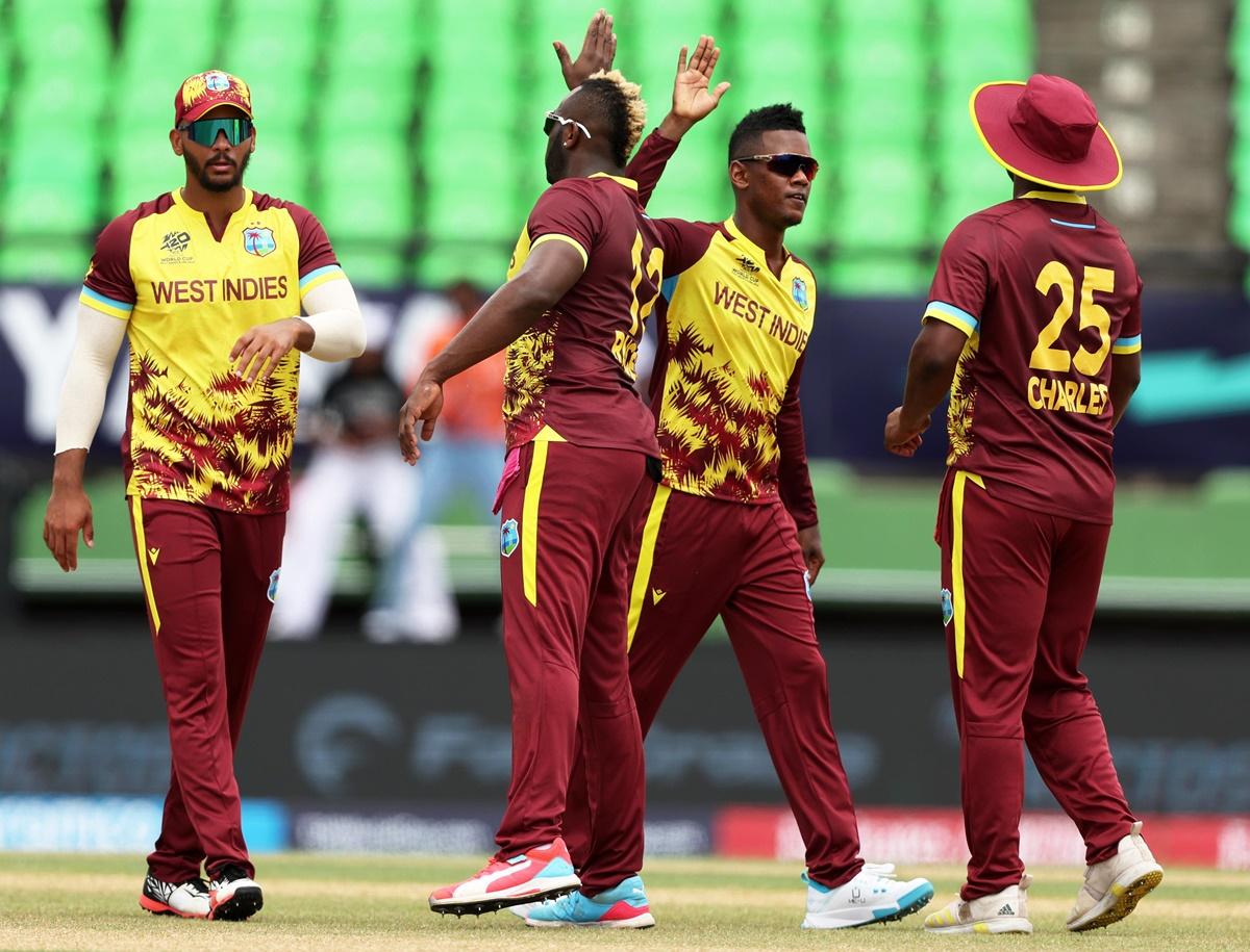 Akeil Hosein celebrates the wicket of Lega Siaka