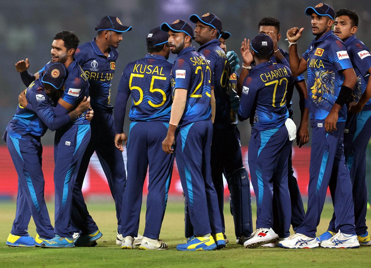 Sri Lanka's players celebrate a wicket.