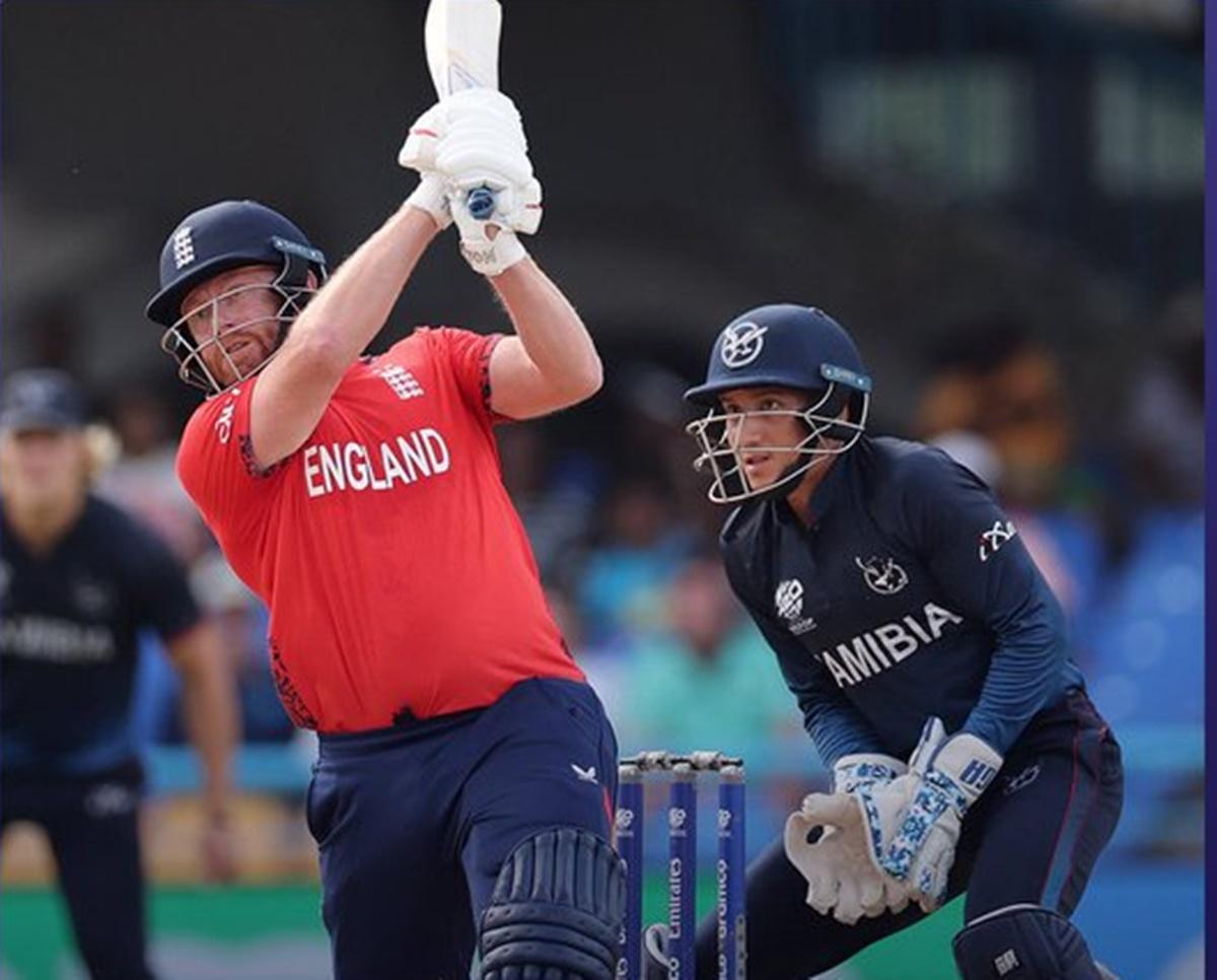 Jonny Bairstow sends the ball over the boundary.