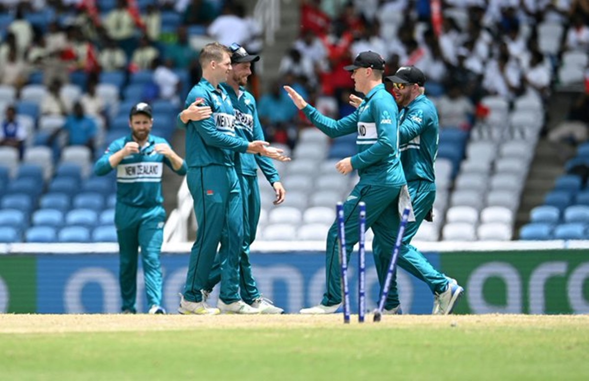 Lockie Ferguson is congratulated by teamates after his sensational 4-4-0-3 spell as New Zealand bowled out Papua New Guinea out for 78 in the T20 World Cup Group C match in Trinidad on Monday.