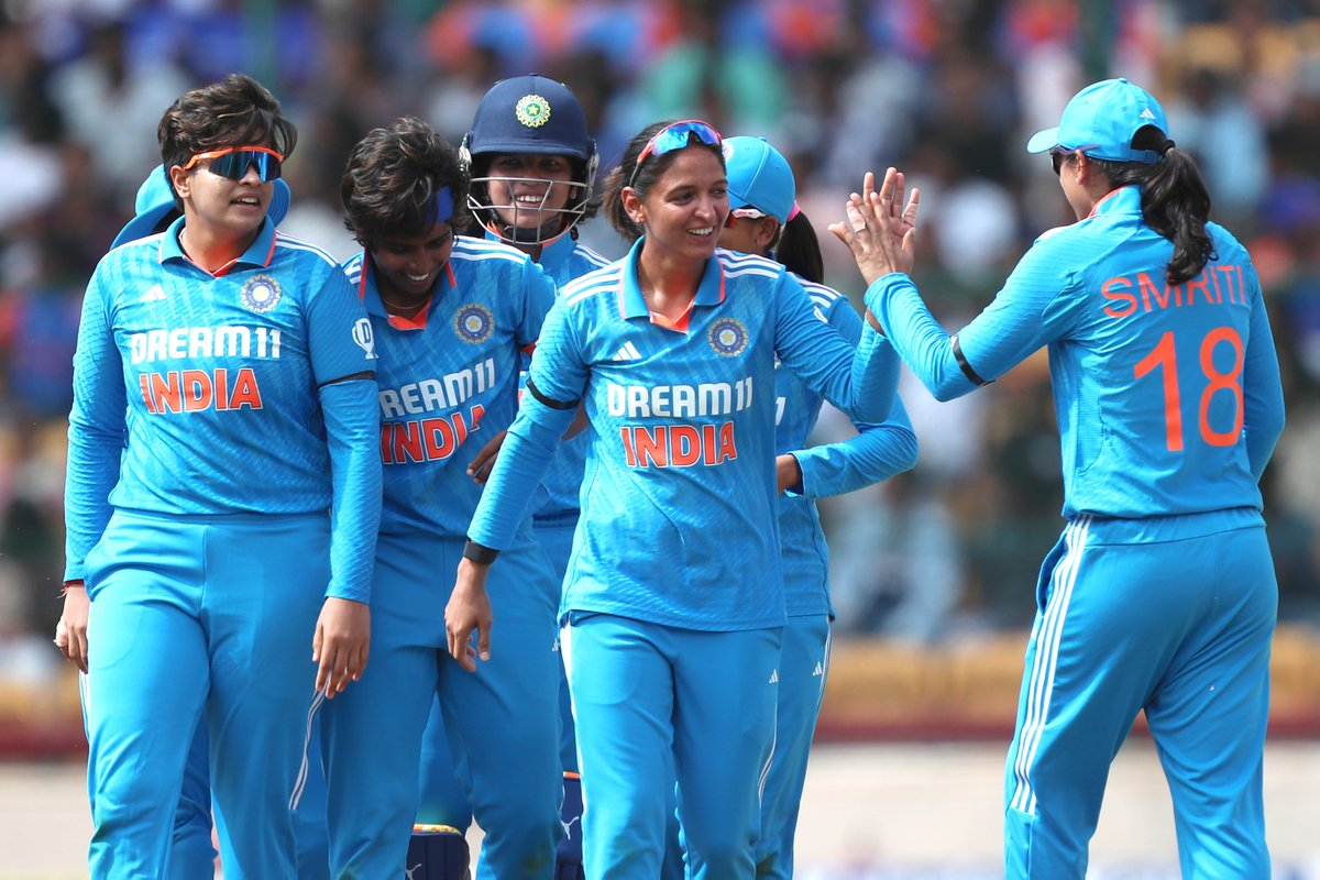 Indian players celebrate after Arundhati Reddy takes a wicket