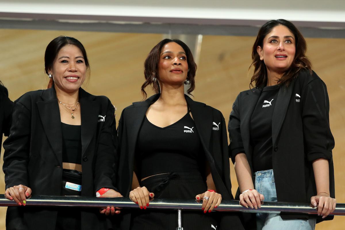 Boxing champion MC Mary Kom, fashion designer Masaba Gupta and Bollywood superstar Kareena Kapoor Khan enjoy the WPL match between RCB and Delhi Capitals in New Delhi on Sunday