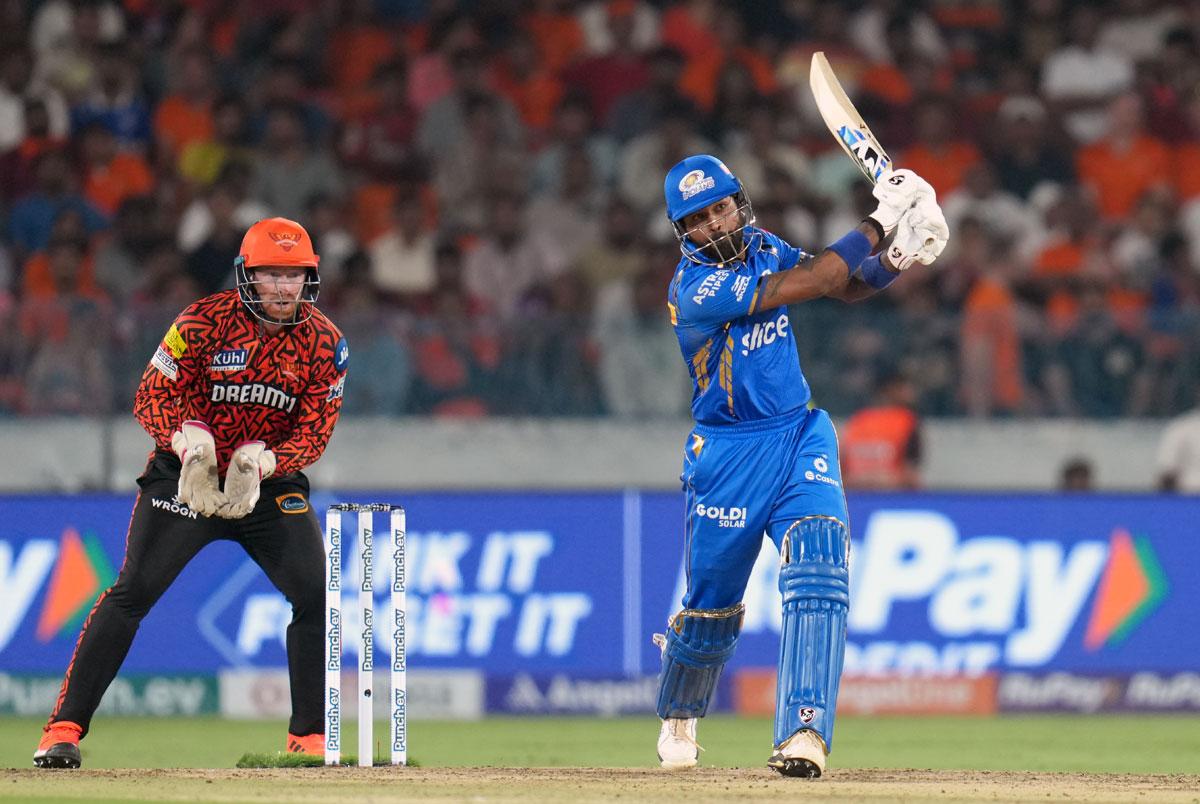 Hardik Pandya hits a six.