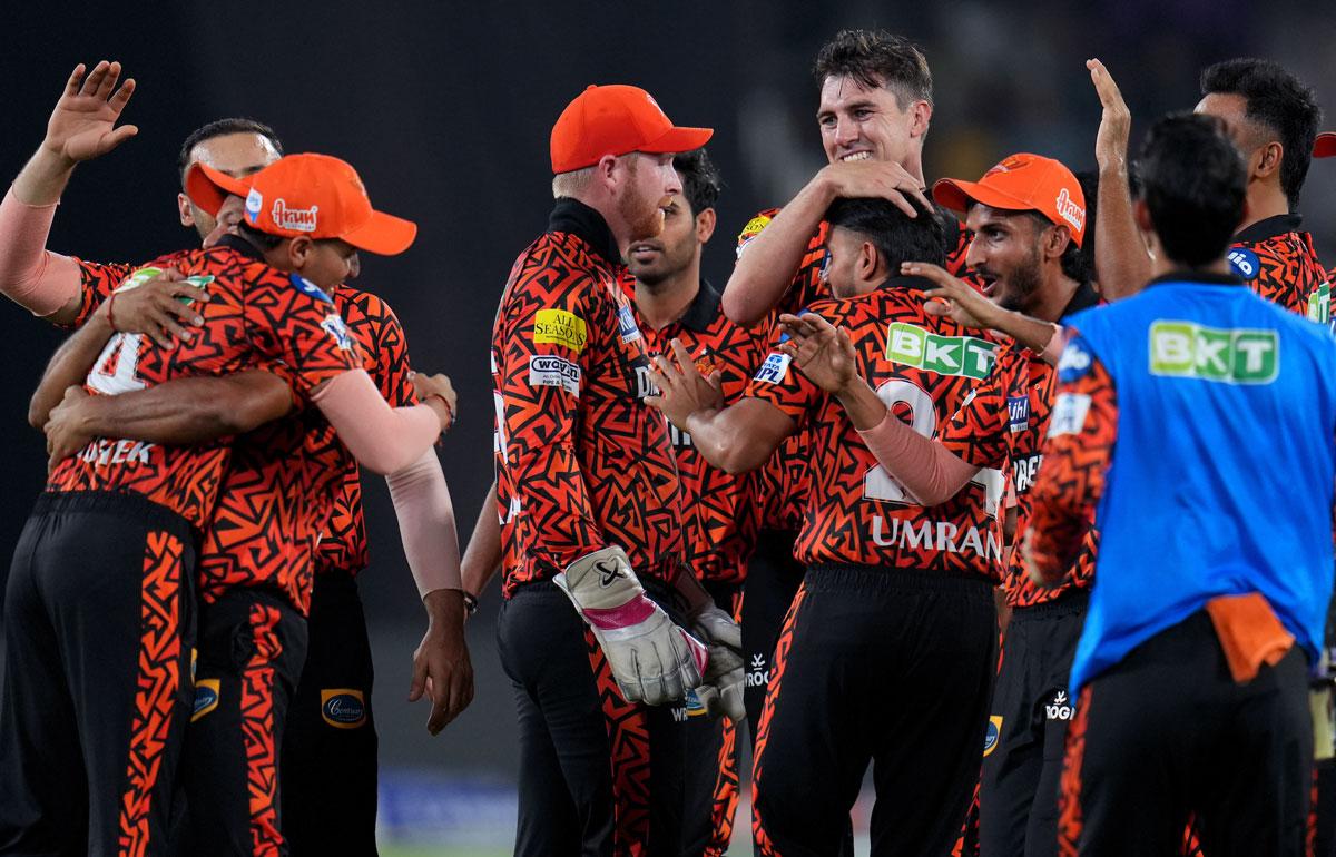 Sunrisers Hyderabad's players celebrate afer Pat Cummins dismissed Rohit Sharma.