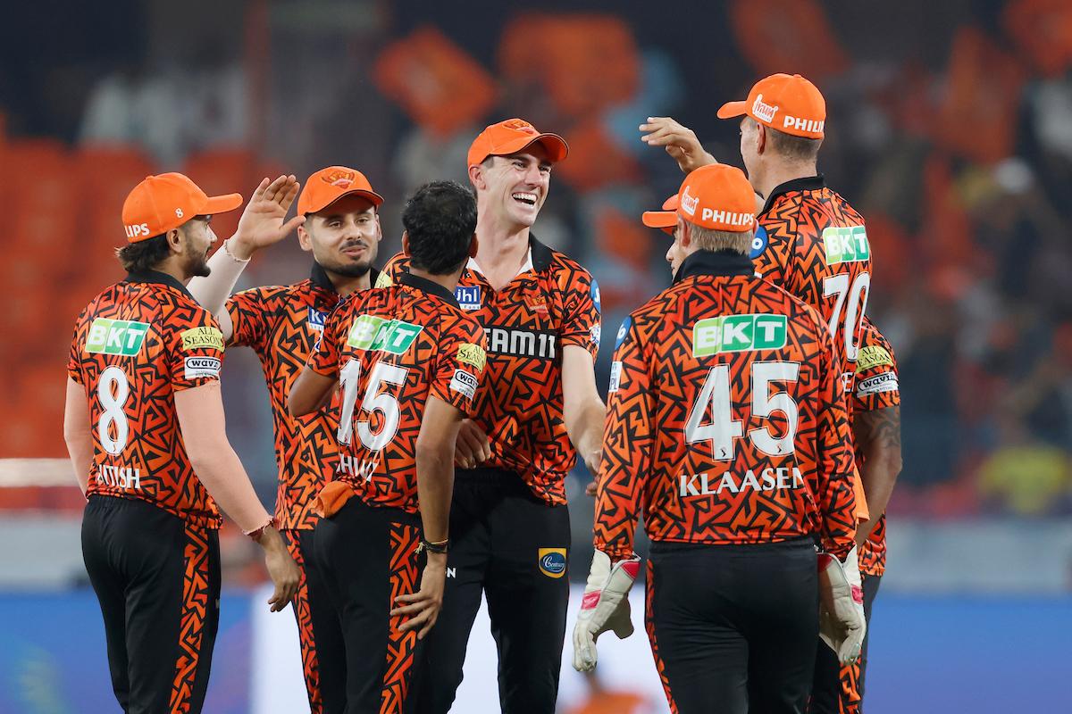 Sunrisers Hyderabad players celebrate after Bhuvneshwar Kumar dismisses Jos Buttler during the IPL match against Rajasthan Royals at Rajiv Gandhi International Stadium, Hyderabad, on May 2, 2024.