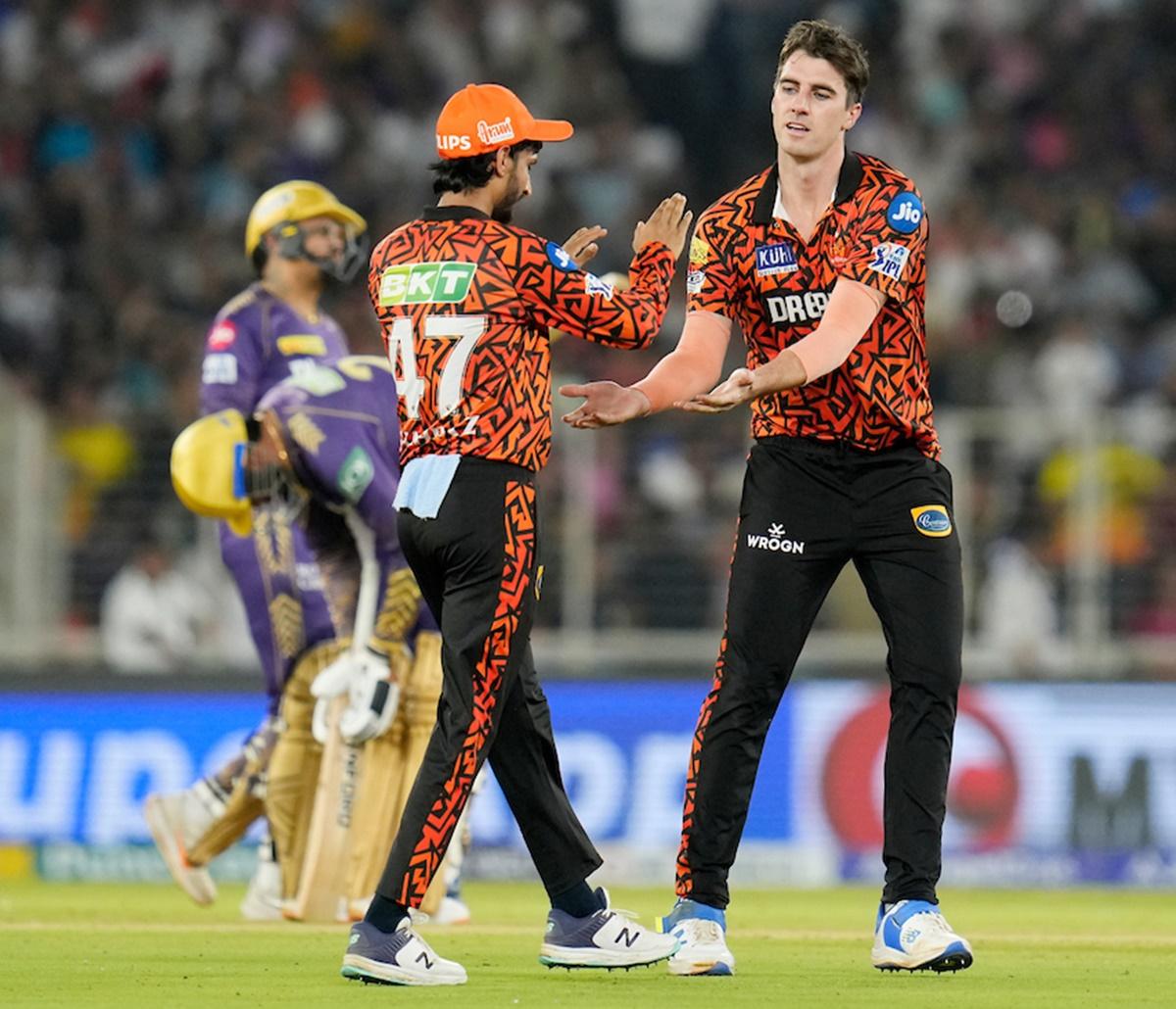 Pat Cummins celebrates the wicket of Sunil Narine