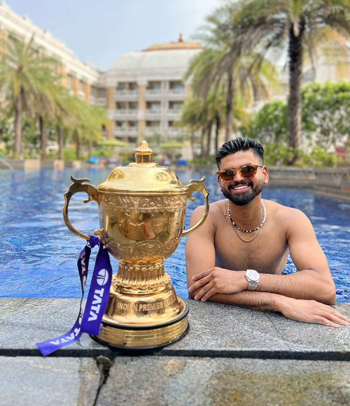 Shreyas Iyer celebrates with the IPL Trophy at the hotel pool on Monday
