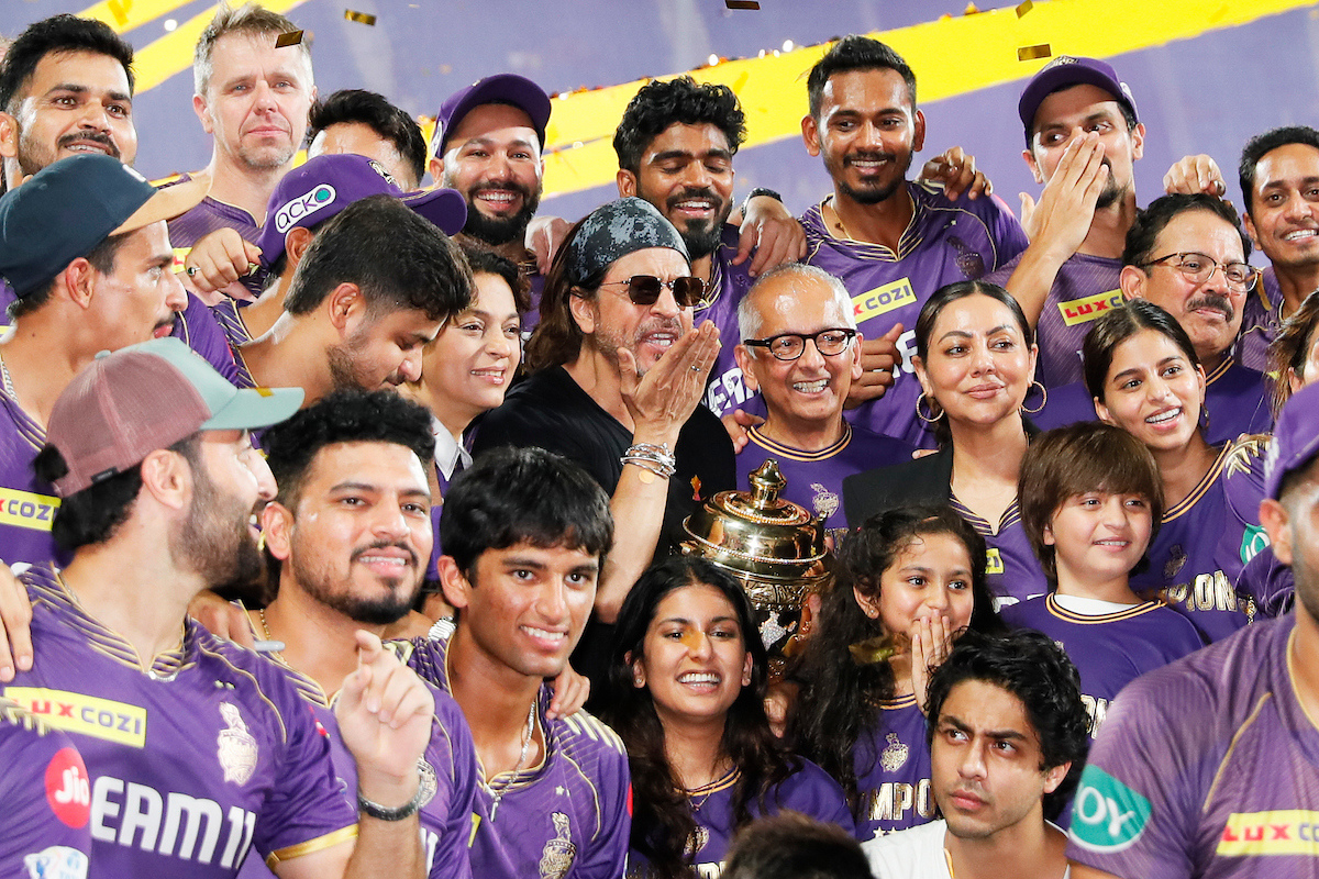 KKR co-owners Shah Rukh Khan and Juhu Chawla and families celebrate with the team following their IPL win in Chennai on Sunday, May 26